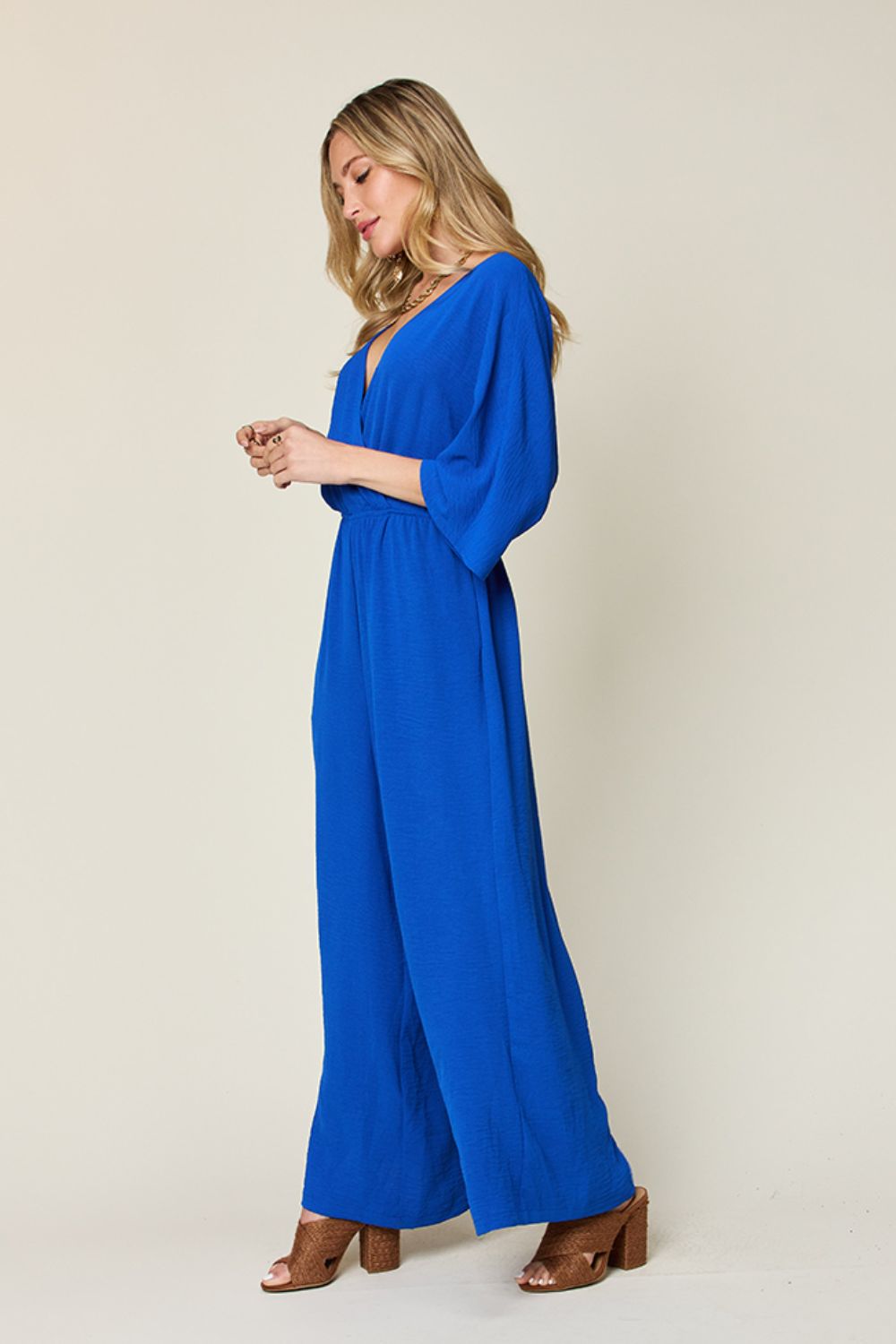 Double Take Full Size Surplice Wide Leg Jumpsuit with Pockets-Very Besty