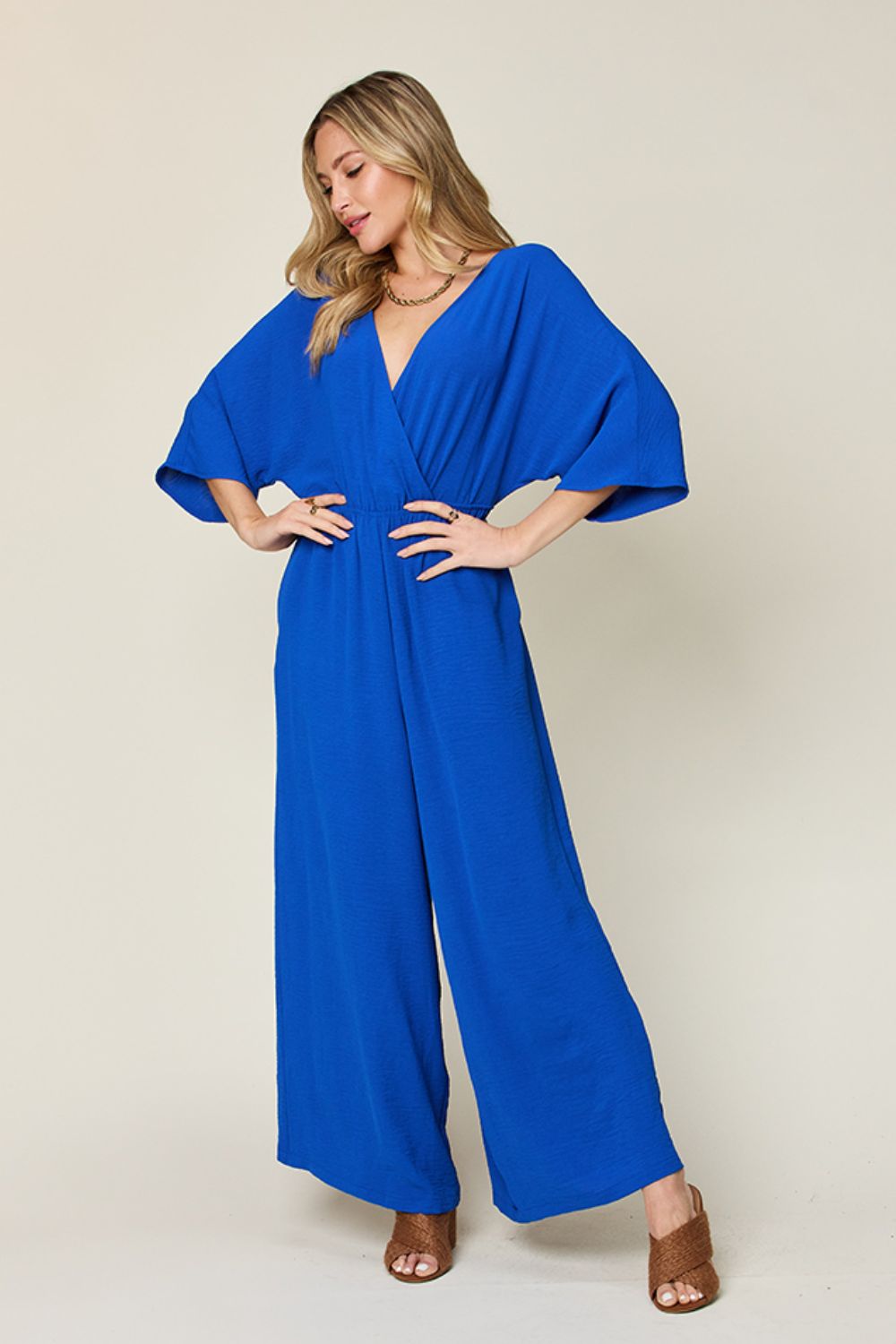 Double Take Full Size Surplice Wide Leg Jumpsuit with Pockets-Very Besty